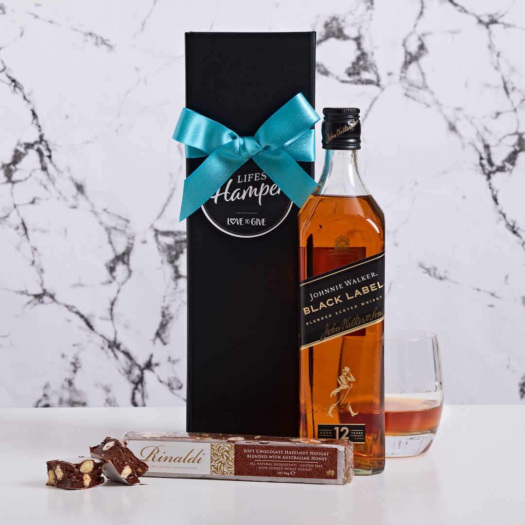 Johnny walker hamper includes a bottle of Johnny Walker black label and choc hazelnut nougat