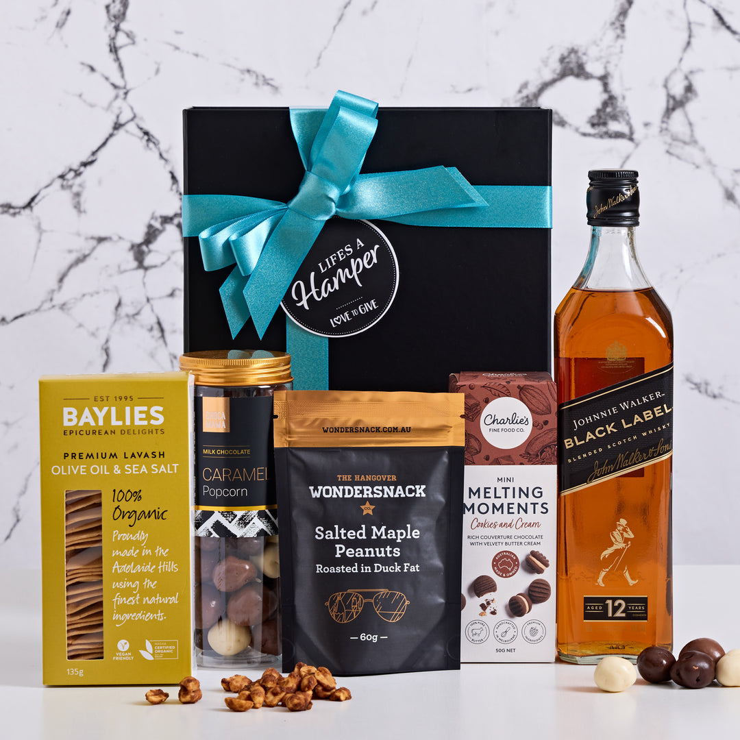 Scotch Lover hamper includes a Johnnie Walker Black label with a selection of gourmet treats.