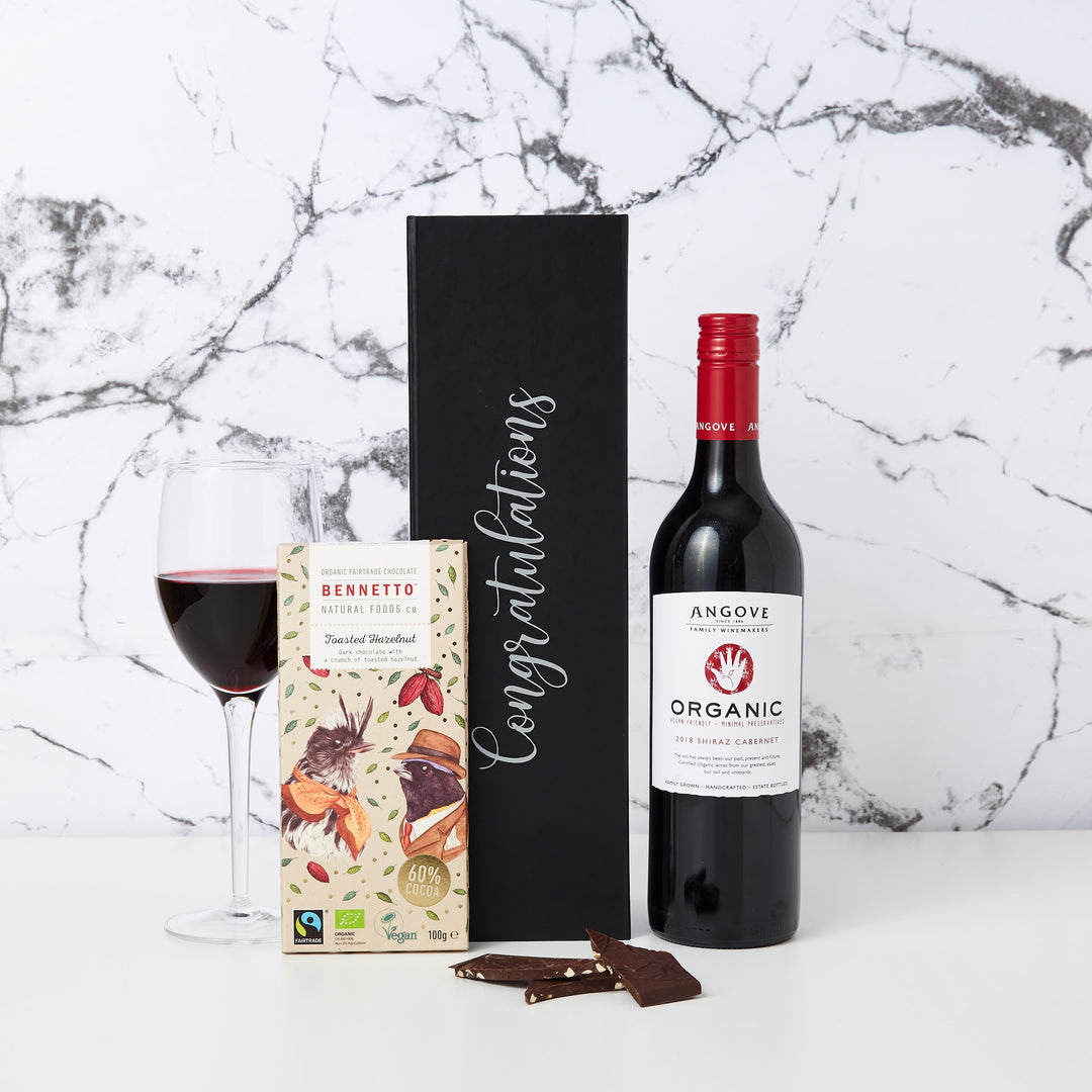 Congratulations Organic Red Wine and Chocolate Hamper is a great gift for your corporate clients. This hamper comes personalised with Congratulations printed in custom decal lettering a bottle of Shiraz Cabernet and a delicious block of Bennetto Chocolate.