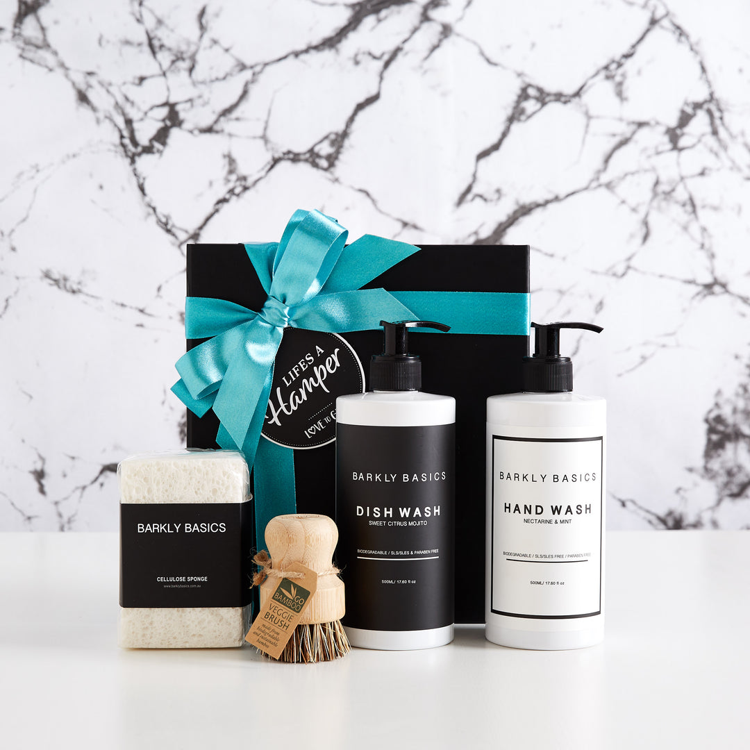 Luxury Kitchen Settlement Hamper makes the perfect housewarming gift idea. It comes with a dish wash, hand wash, sponges and veggie brush.