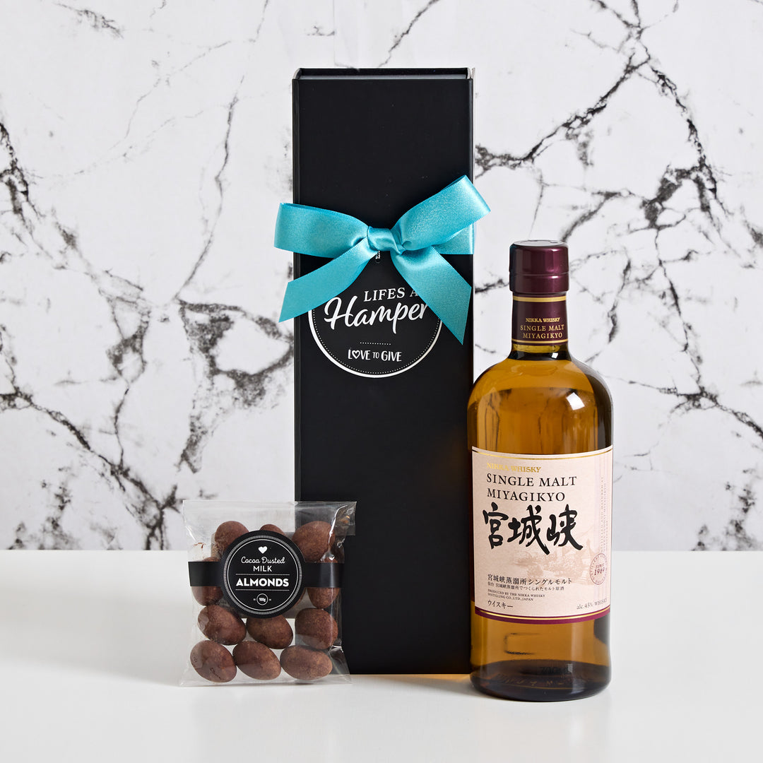 Nikka Japanese Single Malt Whisky Hamper and Chocamama cocoa dusted milk chocolate almonds. This gift makes a great gift for your client or friend that enjoys Japanese whisky