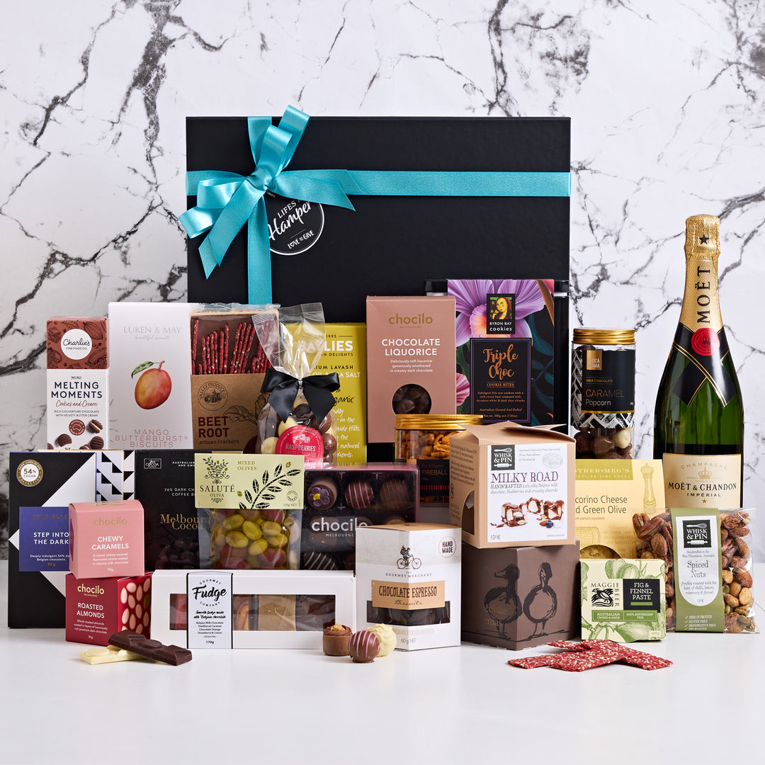 Moet Team Celebration Hamper is the perfect corporate gift hamper. This is a great office share hamper and comes stylishly presented in our signature Lifes A Hamper Gift Box.
