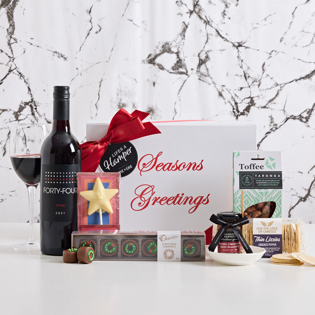 Gourmet Christmas Hamper comes with a personalised Season's Greeting gift box, filled with a bottle of shiraz & a delicious selection of gourmet treats. Say Merry Christmas and thank your staff & clients this festive season with our gourmet Christmas Hamper.