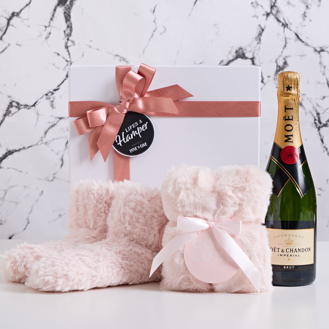 Pamper her in style with our cozy luxurious pamper hamper. This hamper comes with a bottle of Moet & Chandon, cozy luxe winter booties & a luxurious heat pillow. The perfect gift to spoil her with on her birthday of Mother's Day.