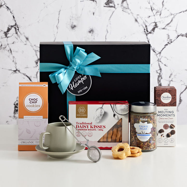 Afternoon tea gift hamper is the perfect get well soon gift hamper. Included in this hamper is an organic tea, strainer and cookies to compliment the flavours. With Free Shipping Australia wide this hamper makes a great get well soon or Mother's Day gift hamper.