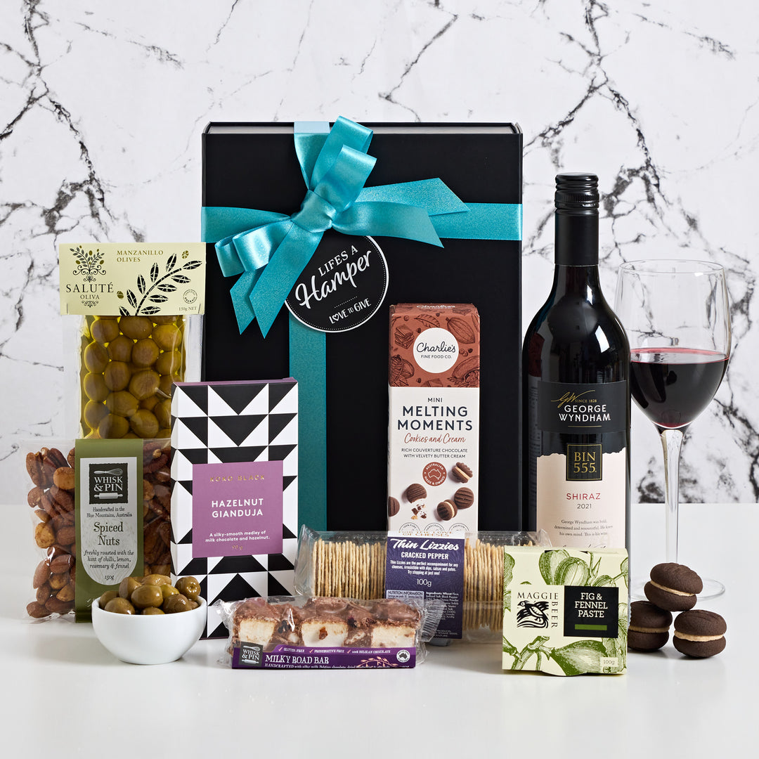 Drop of Red comes with a delicious bottle of Bin 555 shiraz along with a selection of sweet & savoury gourmet delights your recipient will enjoy. The perfect gift to say Thank you or Merry Christmas to a client.