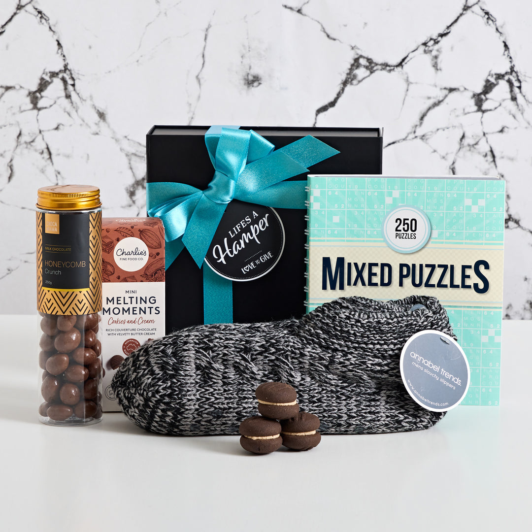 Mens get well hamper includes Chocamama honeycomb crunch, mixed puzzle book, annabel trends slouchy slipper socks and a nice selection of treats. Make him feel better with our Men's Get well soon.