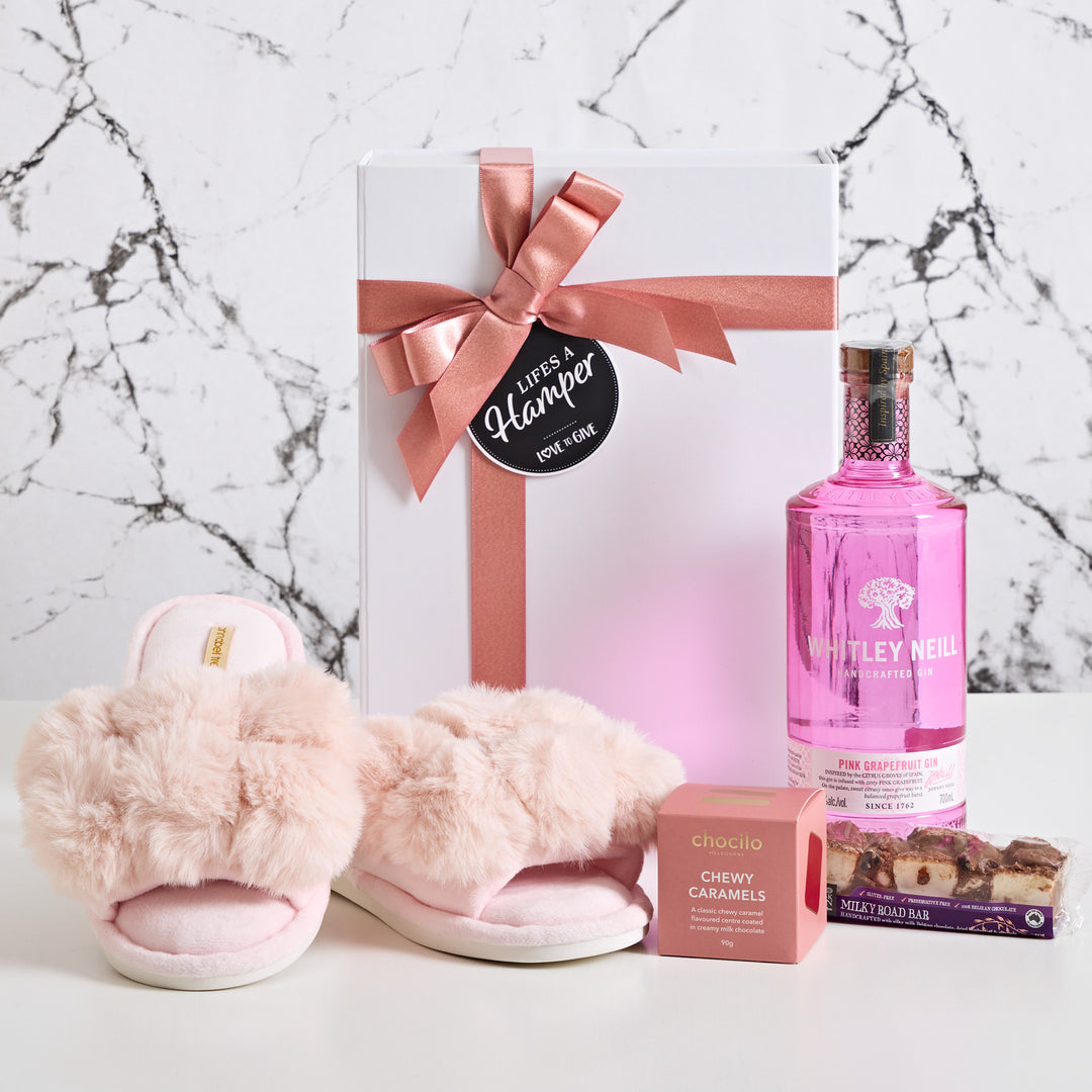Whitley Neill Pink grapefruit gin, Annbel trends pink pom pom slippers, chocilo chewy caramels & whisk & pin milky rocky rd. A selection of products that will impress your recipient