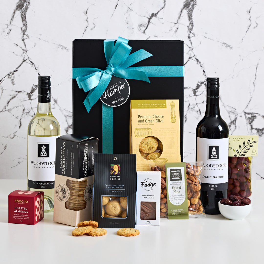 Premium Red & White Wine Hamper includes Woodstock Red & White Wine along with a selection of sweet & savoury treats